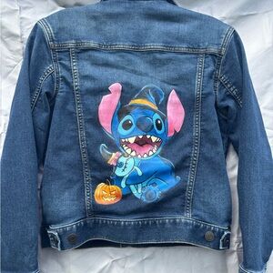 Custom hand-painted denim jacket. Fully washable. Disney Halloween Stitch.